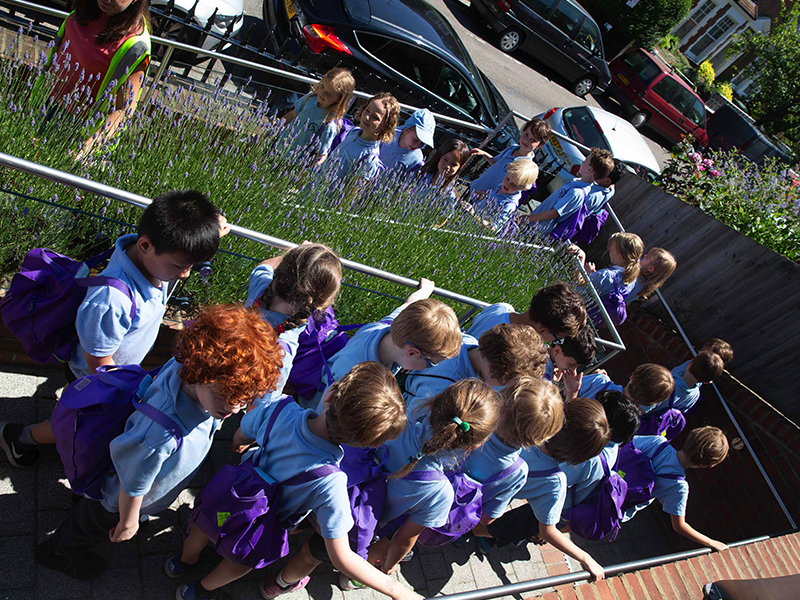 Children walking down a ramp Children walking down a ramp